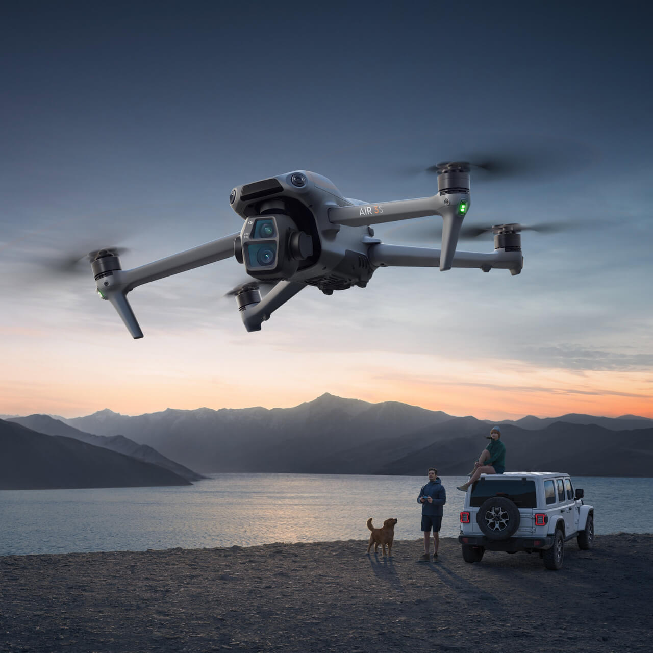 DJI Air 3S flying above a mountain lake